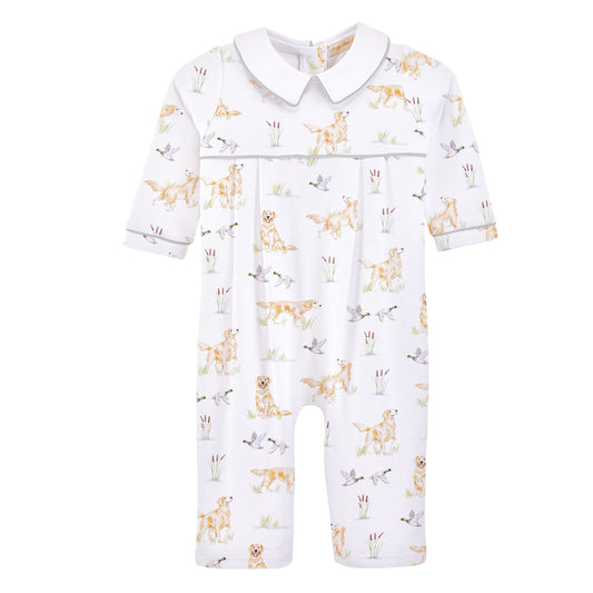 A baby long-sleeve footless romper in white, featuring an all-over print of golden retriever dogs, ducks, and birds. The romper has a white Peter Pan collar and is shown against a plain white background.