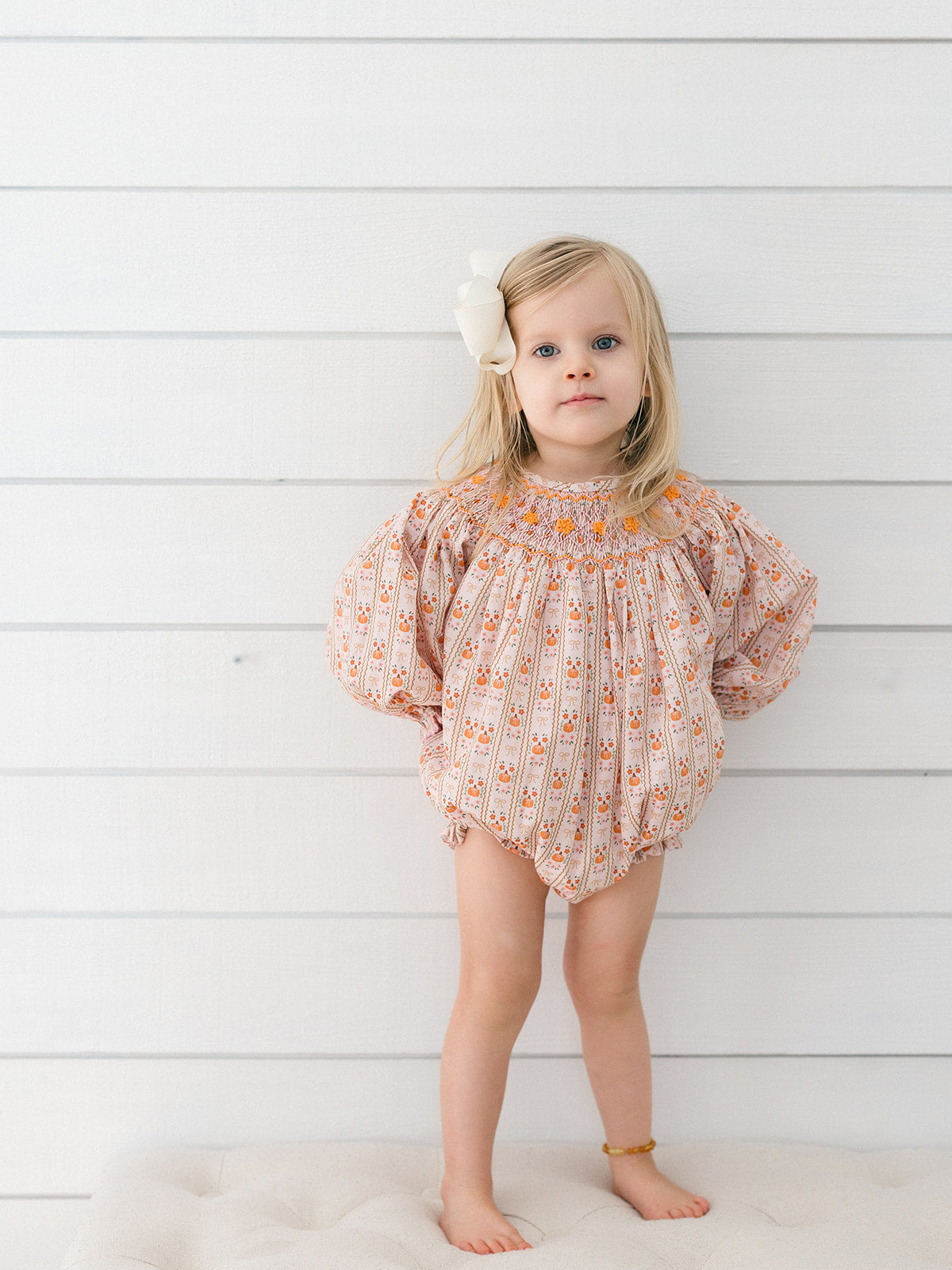 peach and orange floral smocked bubble bubble 