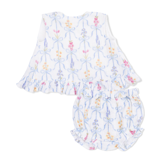 White sleeveless ruffle edge top with a striped ribbon tied bouquet pattern and matching bloomers.