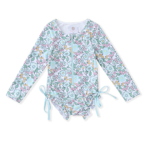 Pale green long sleeve floral swimsuit with side ties.