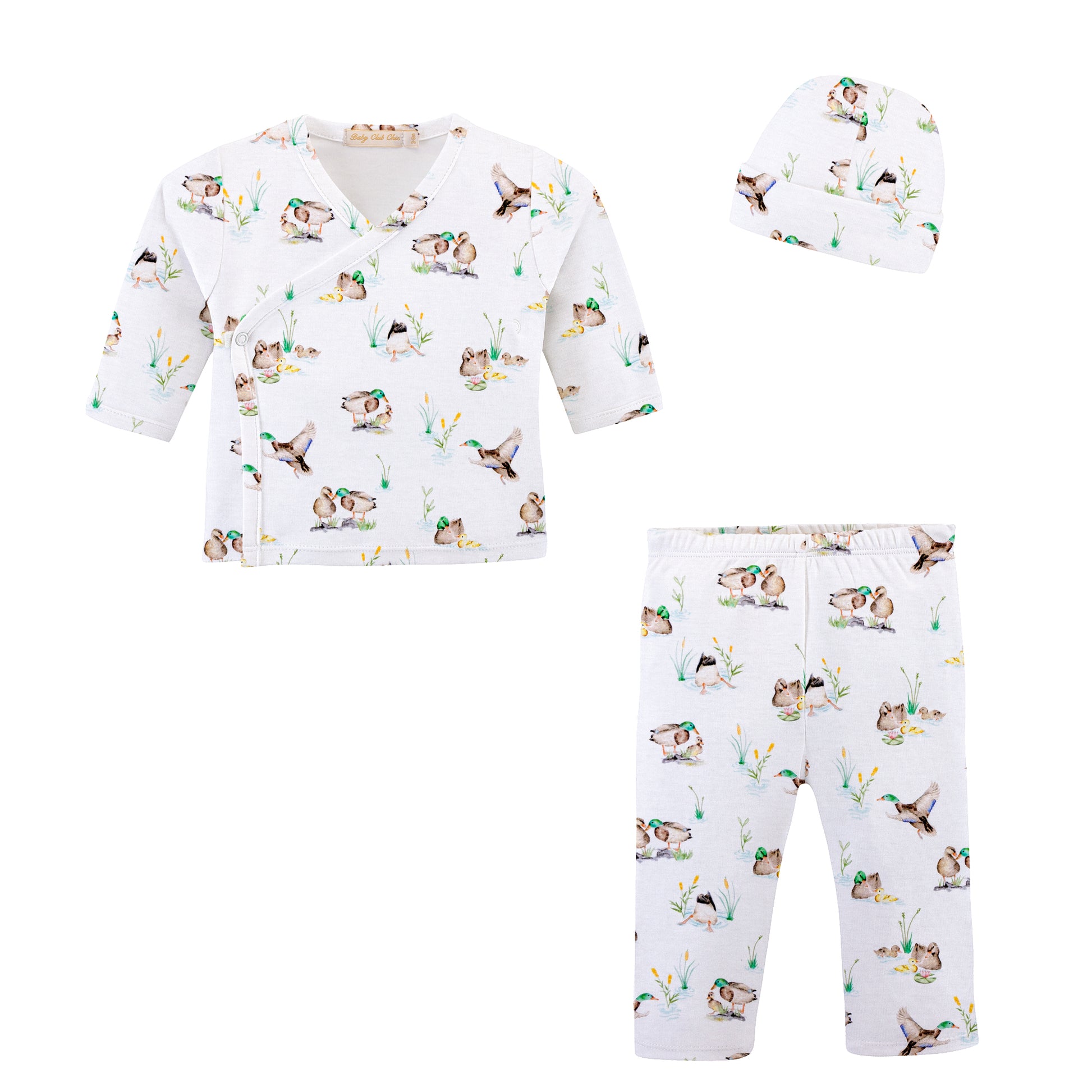 A baby clothing set consisting of a white long-sleeve wrap top, matching pants, and a beanie hat, all featuring a colorful cartoon animal print on a plain white background.