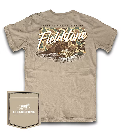 Tan short sleeve tshirt with Fieldstone logo and dog swimming against a camo background.