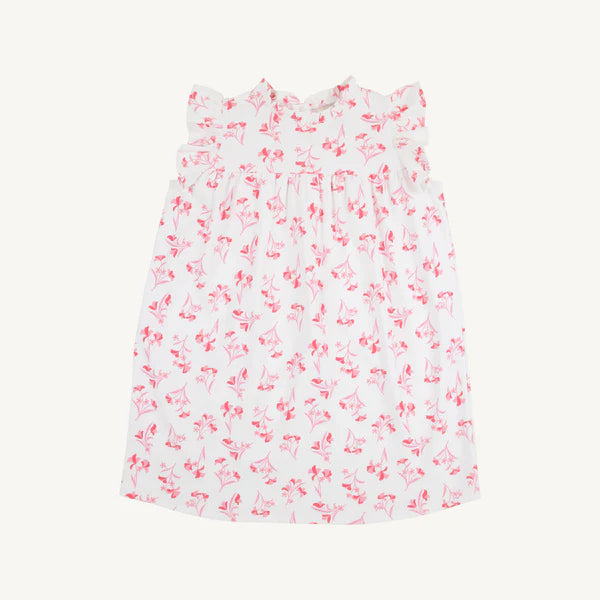 White dress with pink floral pattern on a white background