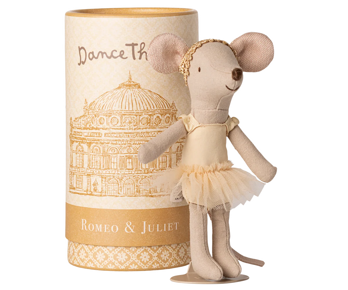 Stuffed mouse doll in a tutu dress next to a cylindrical box with decorative design and text maileg mouse