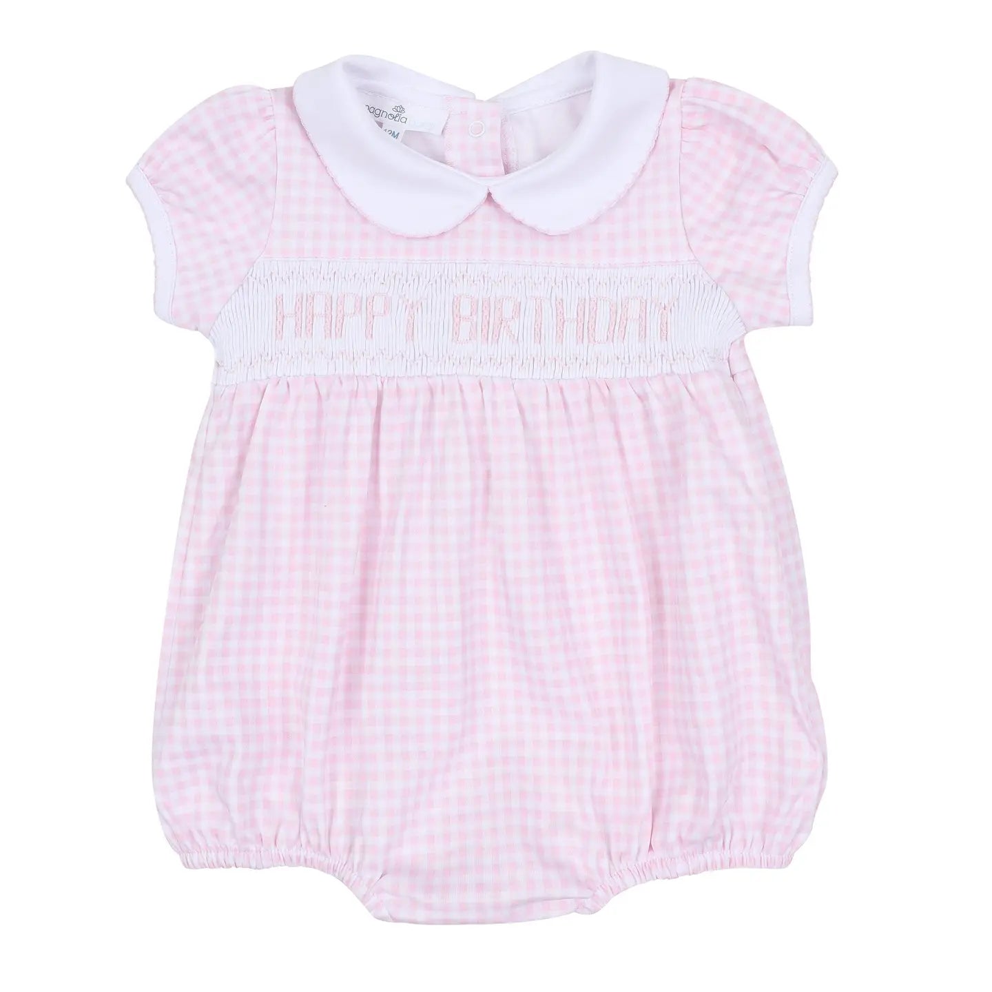 Pink checkered smocked baby romper with 'Happy Birthday' text on a white background