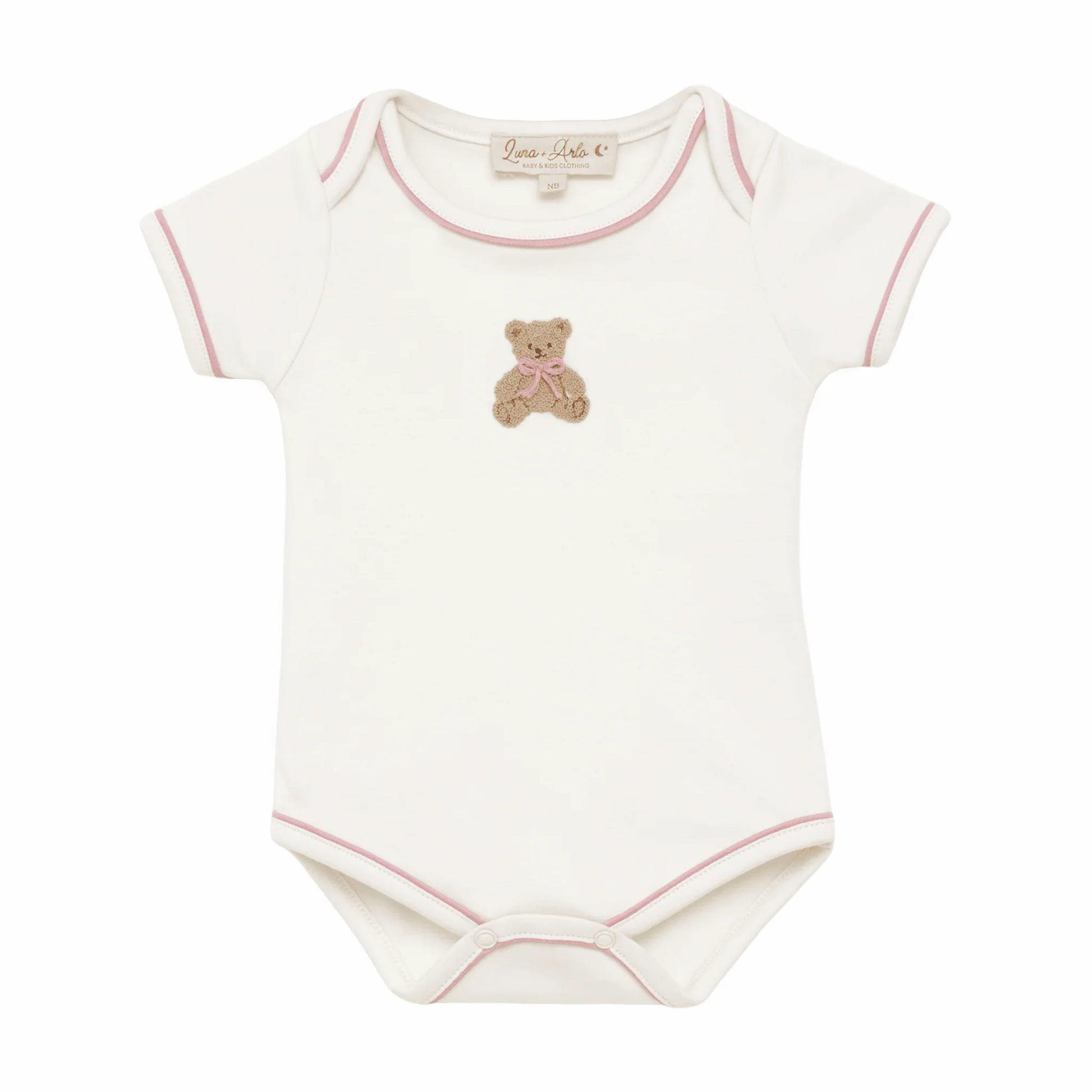 White lap shoulder bodysuit with pink trim and an embroidered bear at the center.