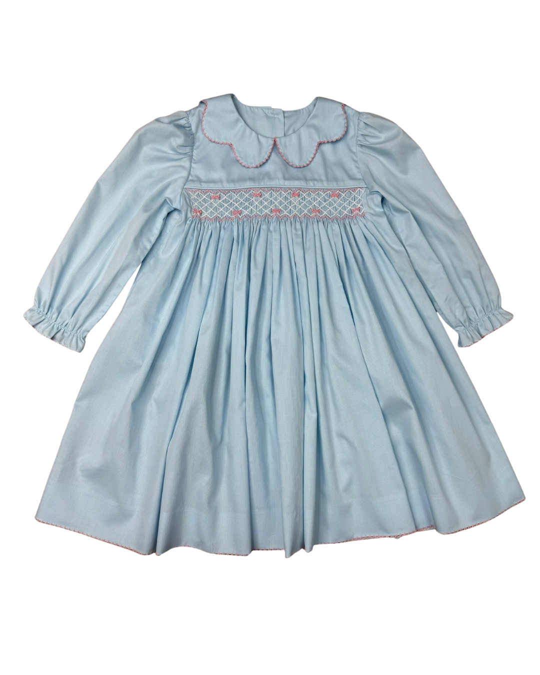 A light blue long-sleeve baby dress with smocked detailing across the chest and a scalloped Peter Pan collar, shown flat against a white background.