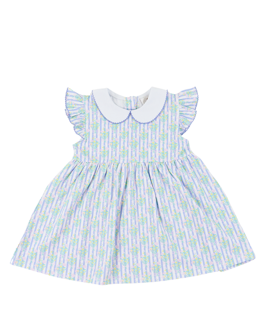 Children's dress with floral pattern blue and purple with flutter sleeves and won a white background