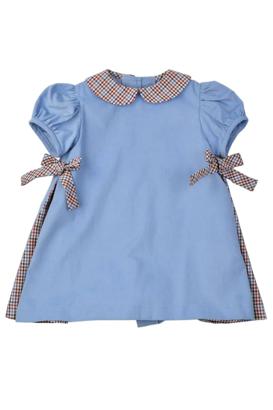 Blue dress with plaid accents on a white background
