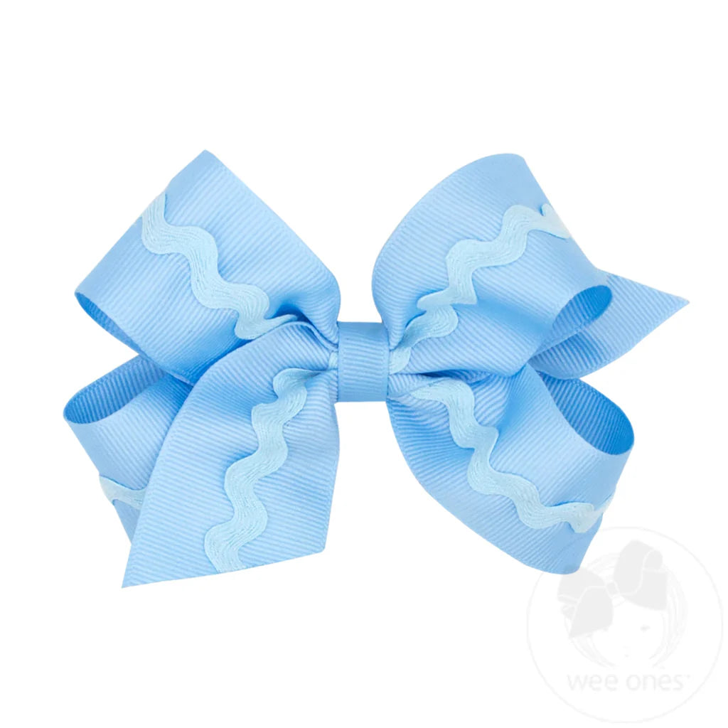 Light blue bow with blue rick rack design