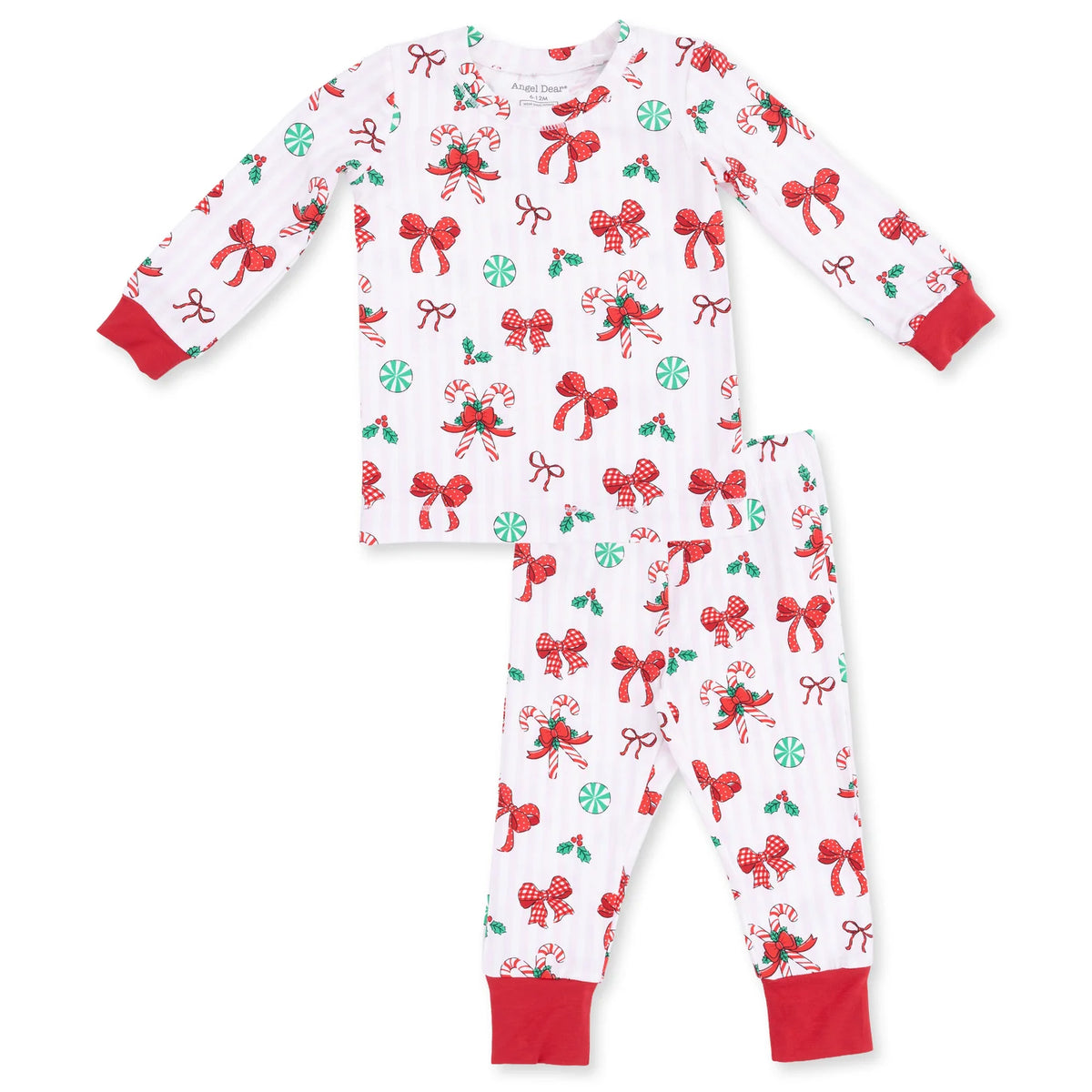 Children's pajama set with red bows and candy cane patterns on a white background and red arm and foot cuffs
