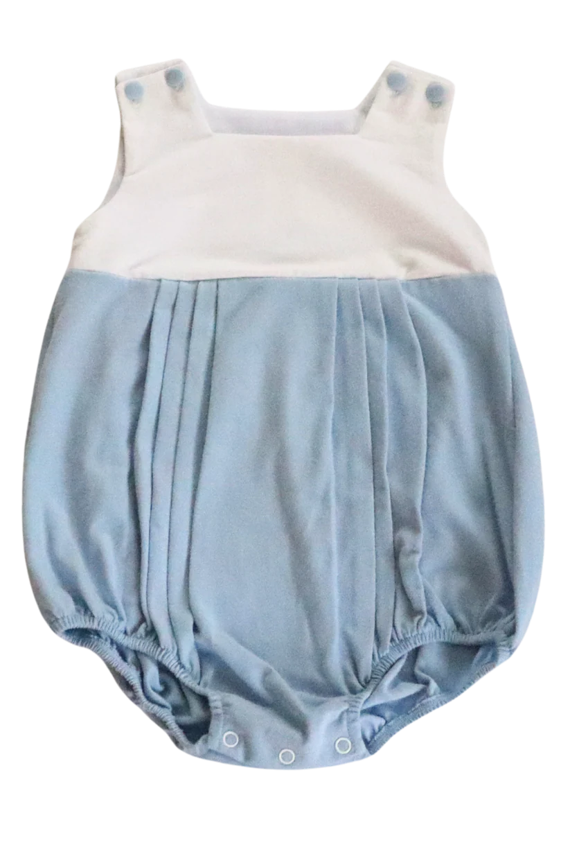 Pleated sleeveless bubble with blue bottom and white top.