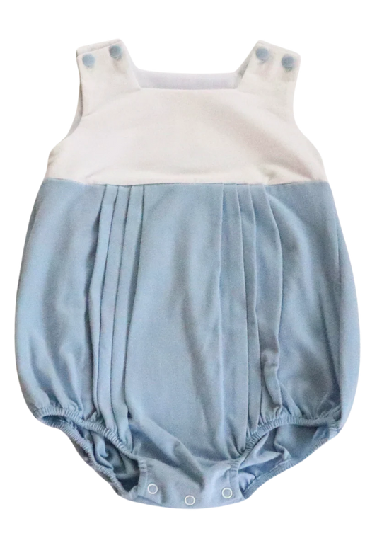 Pleated sleeveless bubble with blue bottom and white top.