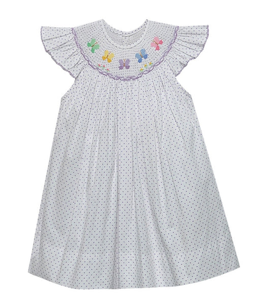 Purple polka dot dress with ruffle sleeves and embroidered butterfly detail on smocked bodice.