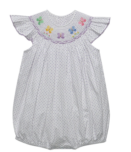 Purple polka dot bubble with ruffle sleeves and embroidered butterflies on smocked bodice.