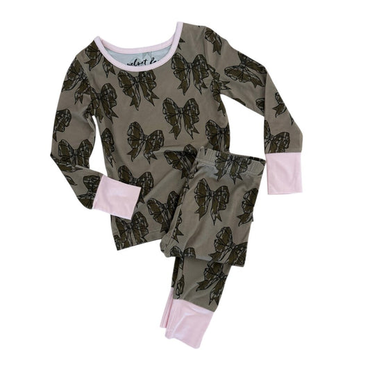 A two-piece pajama set for a child, featuring a long-sleeve top and matching pants in olive green with a black butterfly print and light pink cuffs and collar trim, laid flat on a white background.