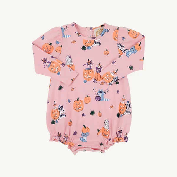 A pink long-sleeve baby romper with a Halloween print featuring pumpkins, cats, and bats, laid flat against a light off-white background.