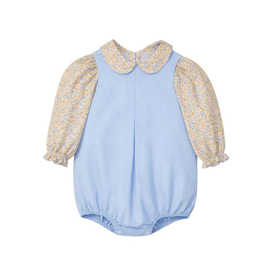A baby girl's short-sleeve bodysuit featuring a light blue body and long sleeves with a yellow and white floral print, complete with a matching light blue Peter Pan collar.