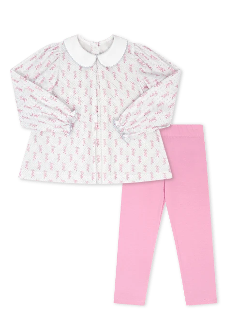 A children's two-piece outfit set featuring a white long-sleeve button-front top with a Peter Pan collar and an allover pink ribbon pattern, paired with solid pink leggings