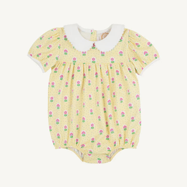 Yellow bubble with pink and green flower design and white collar