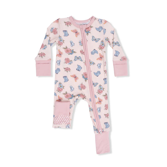 Pale pink romper with allover design of cowboy boots, butterflies and flowers.  Converts from footed to footless.