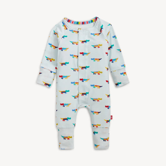 Pale blue coverall with colorful crocodile pattern.