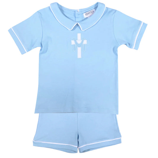 Light blue short sleeve shirt with white piping and matching shorts; cross applique on shirt.
