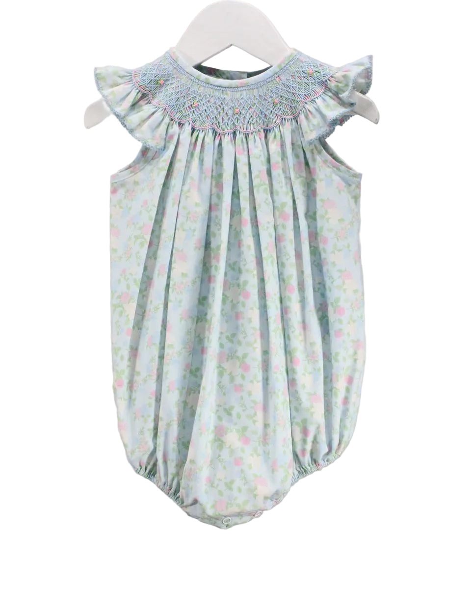 Floral smocked blue baby bubble with ruffle short sleeve.