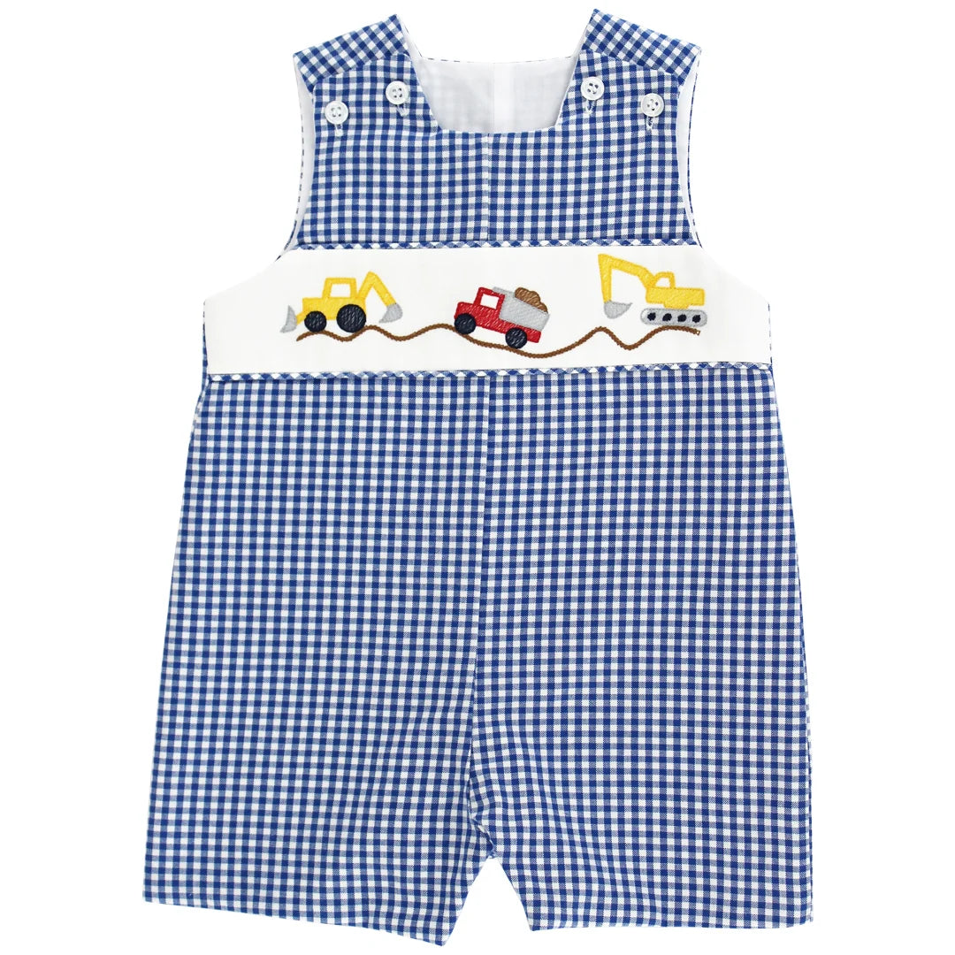 Blue gingham baby romper with construction vehicle design on the chest