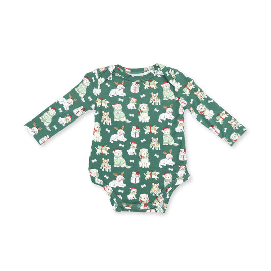 A long-sleeve baby bodysuit in dark green with an all-over print of white dogs wearing Santa hats, scarves, and boots, set against a plain white background.