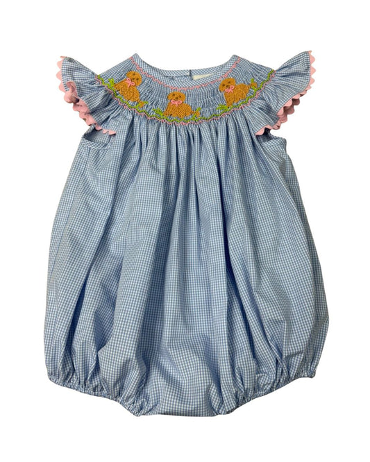 Blue check bubble with pink trim and embroidered dogs on smocked bodice.