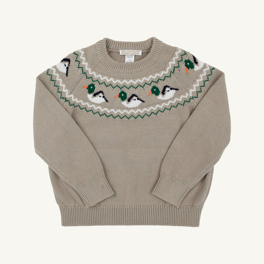 A beige crewneck knit sweater featuring a decorative yoke pattern of green, white, and black birds with orange beaks, laid flat against a light cream background.
