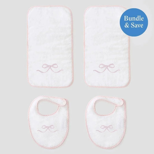 Set of two baby bibs with embroidered bows with two bow burp cloths
