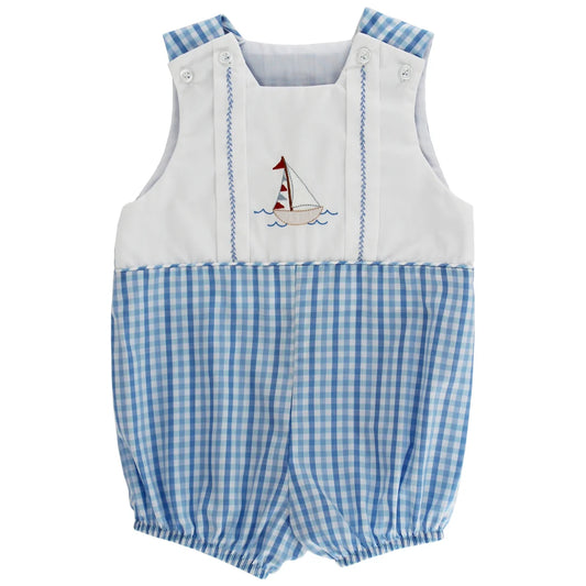 Baby romper with blue checkered pattern and sailboat design on a white background