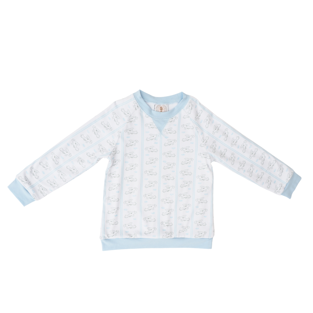A light blue and white long-sleeve baby sweater with a repeating pattern of cartoon animals, laid flat on a white background.