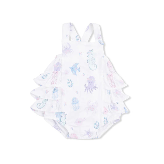 Ruffled sunsuit with a floral sea creature pattern.