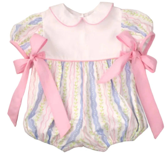 Bubble with patterned pastel stripes, a pink trimmed yoke and collar and a pink tied bow on each side.