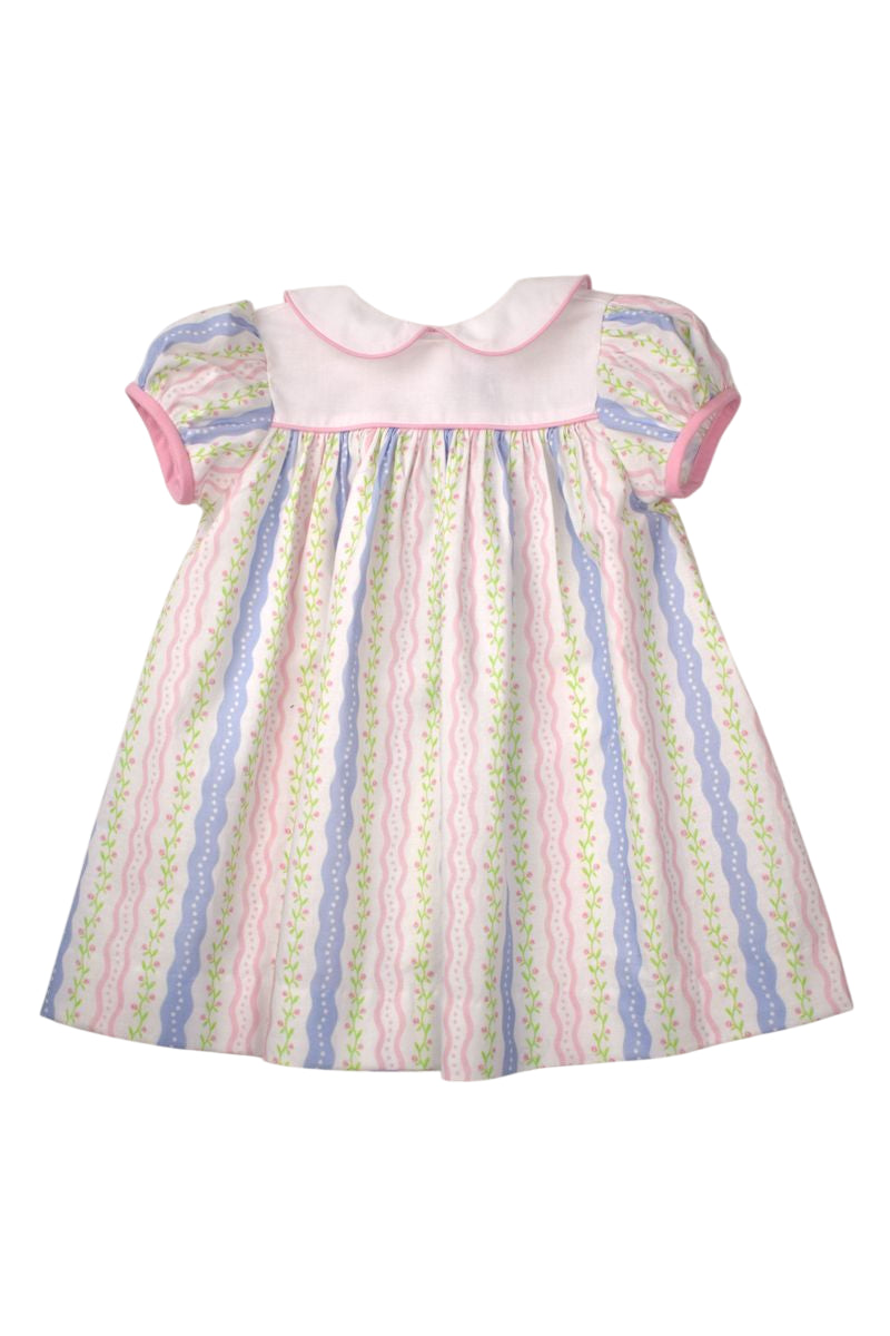 Pastel patterned striped dress with puff sleeves and pink trimmed white yoke and collar.