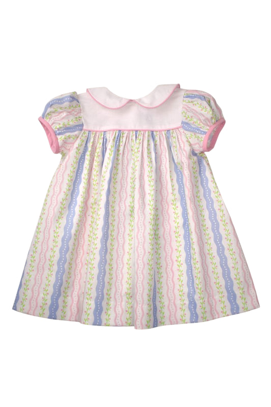 Pastel patterned striped dress with puff sleeves and pink trimmed white yoke and collar.