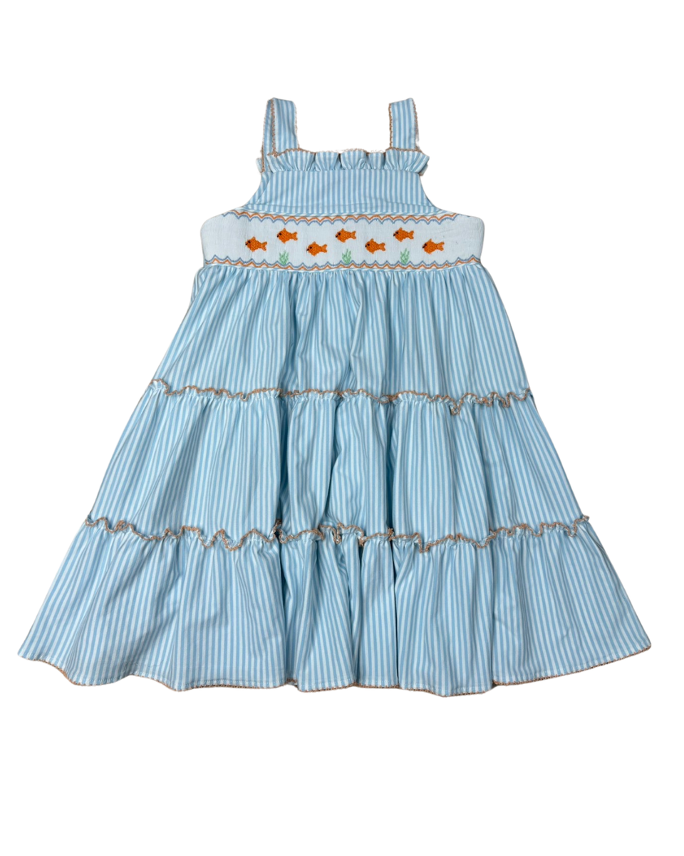 Light blue striped sleeveless ruffle dress with embroidered goldfish on smocked bodice.