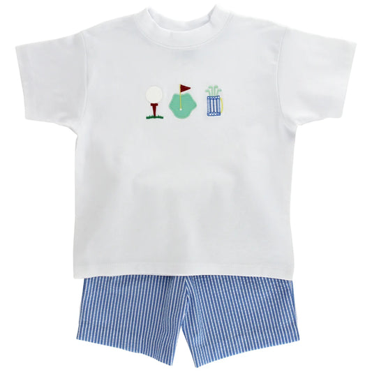 White t-shirt with golf-themed design and blue striped shorts 