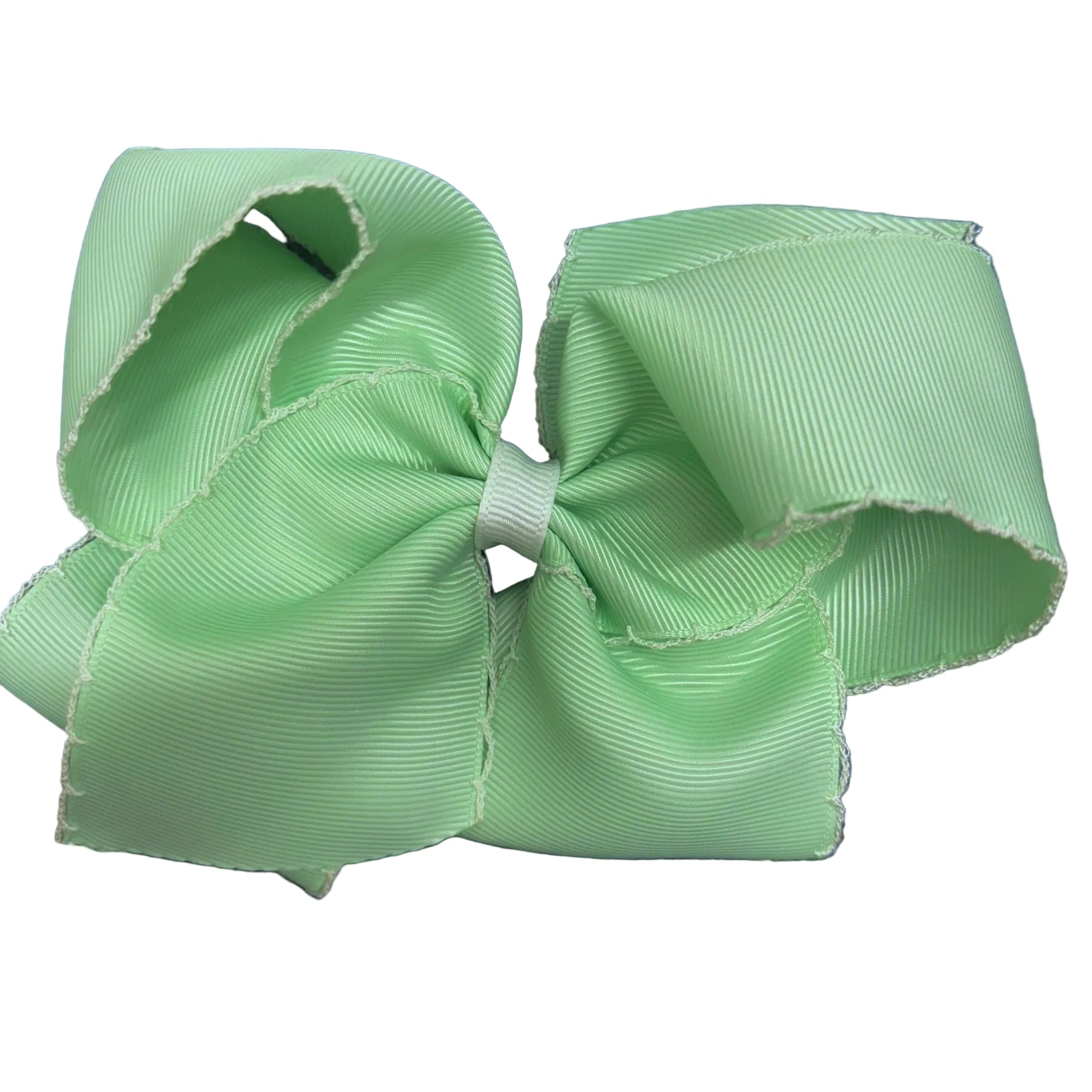 Light green bow with moonstitch edge.