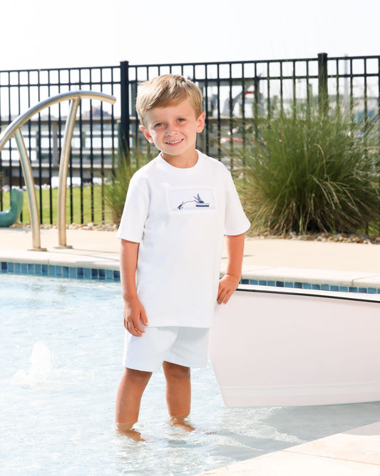 Smocked short set with white smocked top with boat design and light blue/white striped shorts