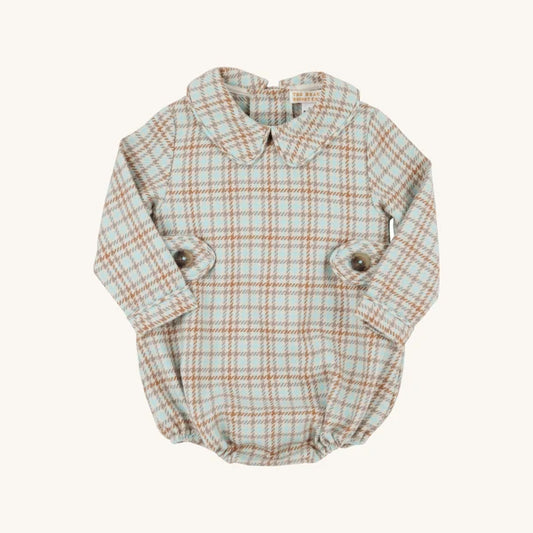 A long-sleeve baby romper in a beige and orange plaid pattern, styled like a collared shirt with buttoned cuffs, shown on a plain off-white background.