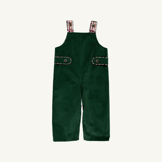 A pair of dark green corduroy baby overalls with red and white plaid shoulder straps and decorative trim on the chest pockets, shown flat on a light cream background.