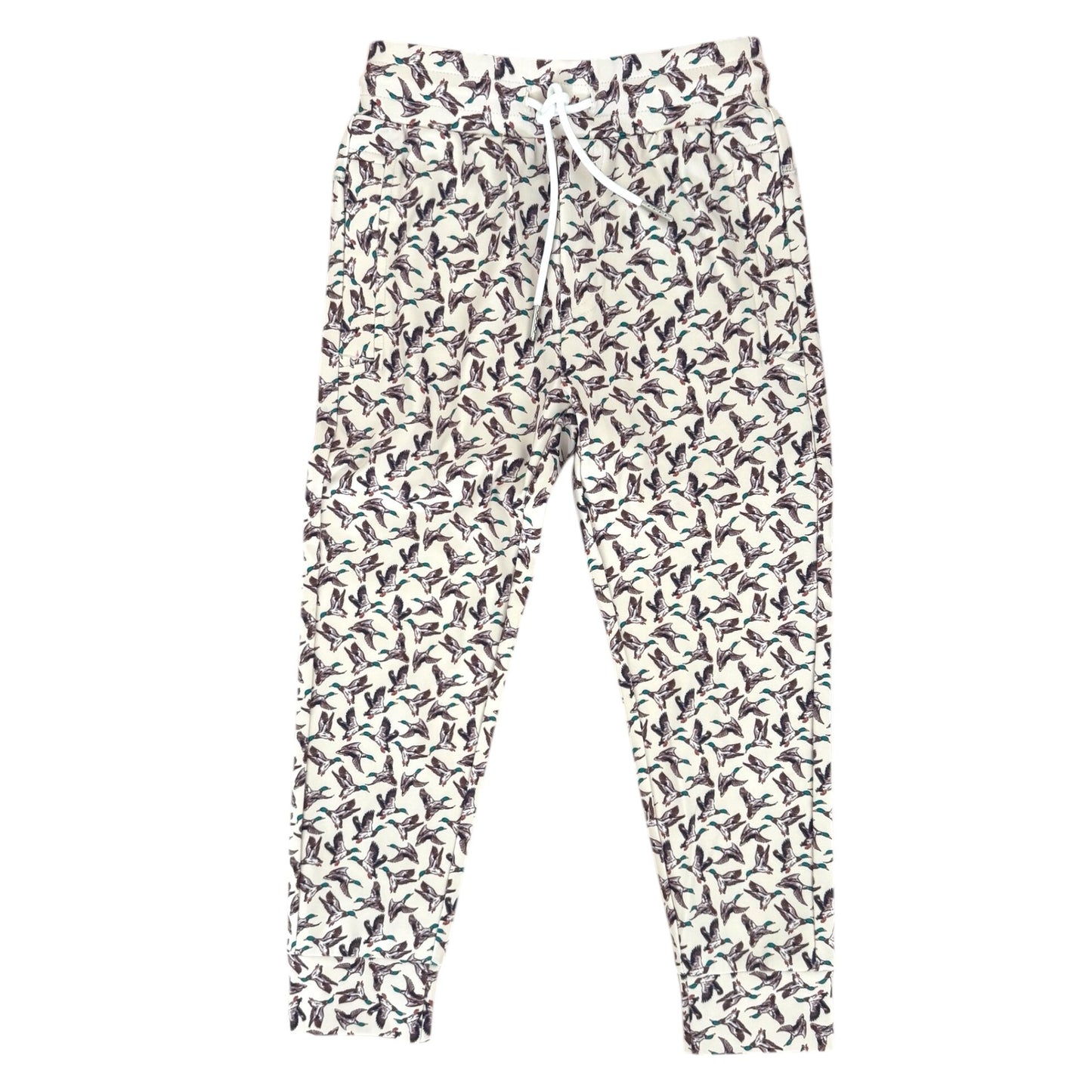 A pair of jogger-style pants with an all-over duck print on a white background, featuring a white drawstring waist and elastic cuffs.