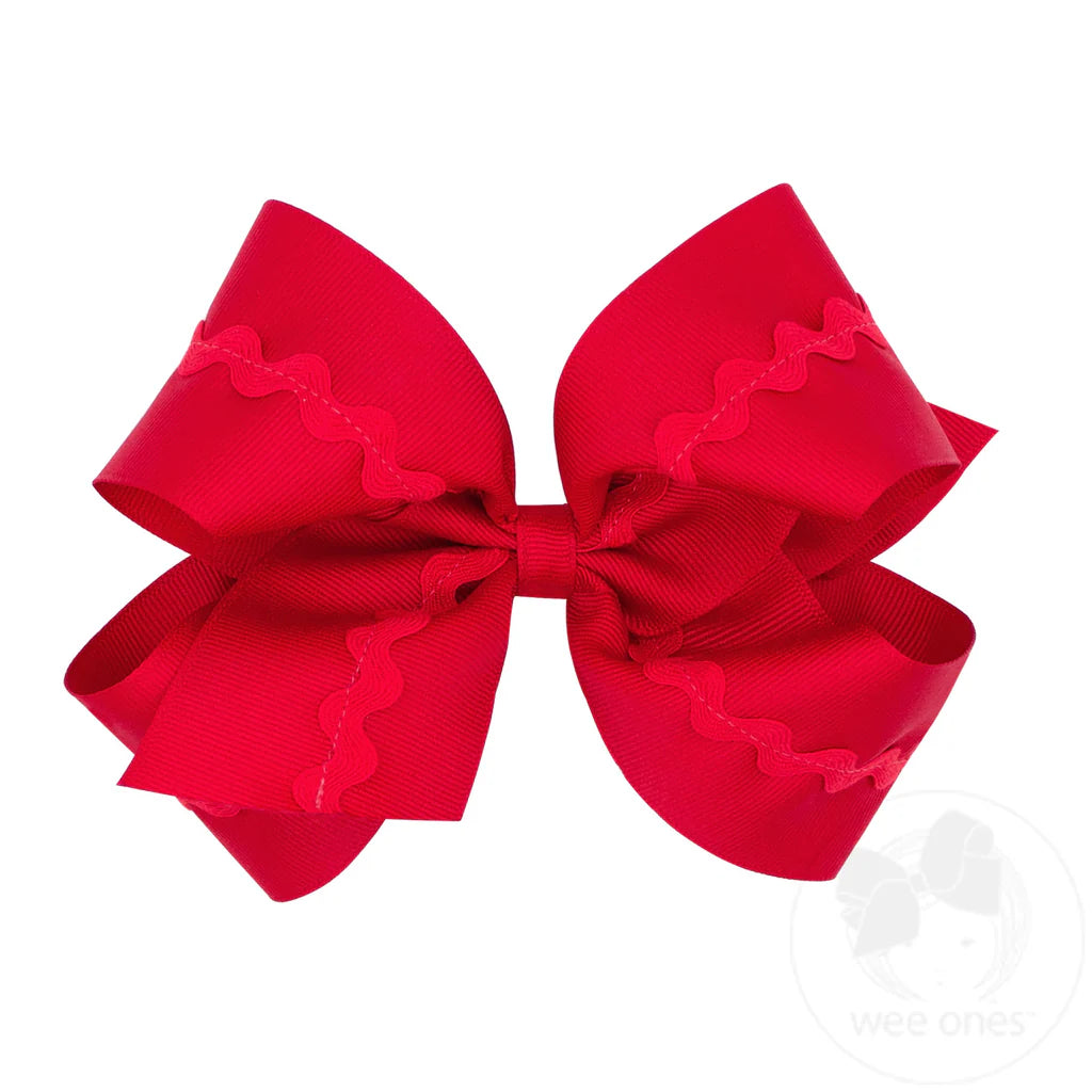 Red bow with red rick rack design 