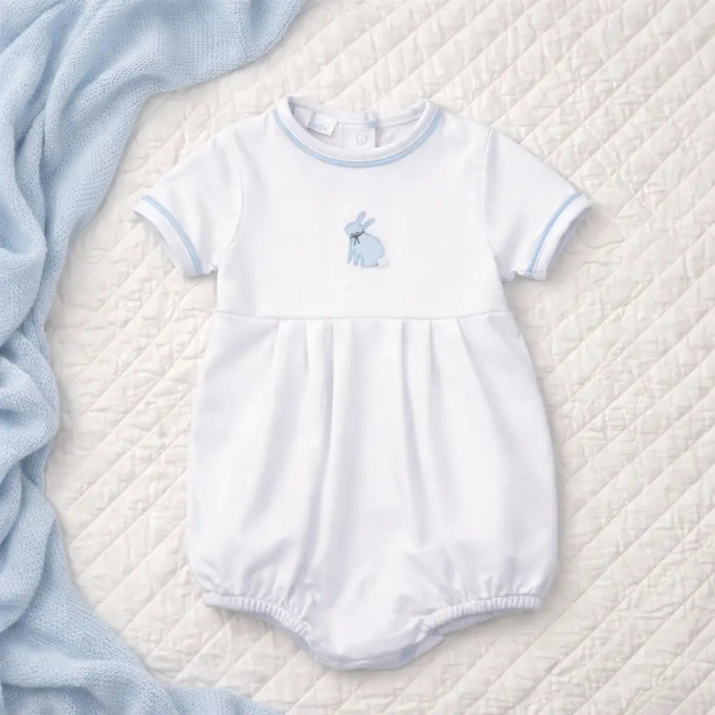 White baby romper with blue trim and embroidered bunny  