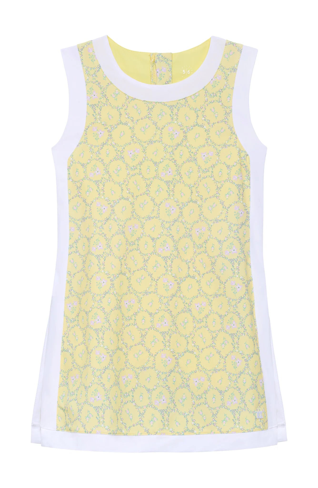 Yellow floral sleeveless dress with white trim with slits on side and biker shorts underneath