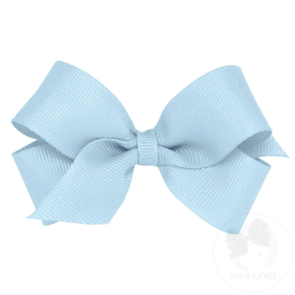 Light blue hair bow  size mini on a white background